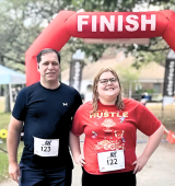 Ashley and her father, Jim, at the Flutie 5K run/walk.