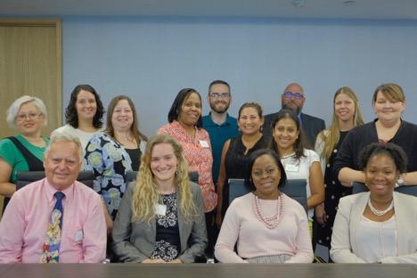 Group of people from the YAI Management Development Training pose for photograph